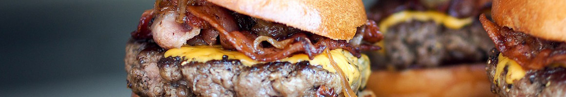 Eating Burger Diner at Moo Moo's Burger Barn restaurant in Stockton, CA.